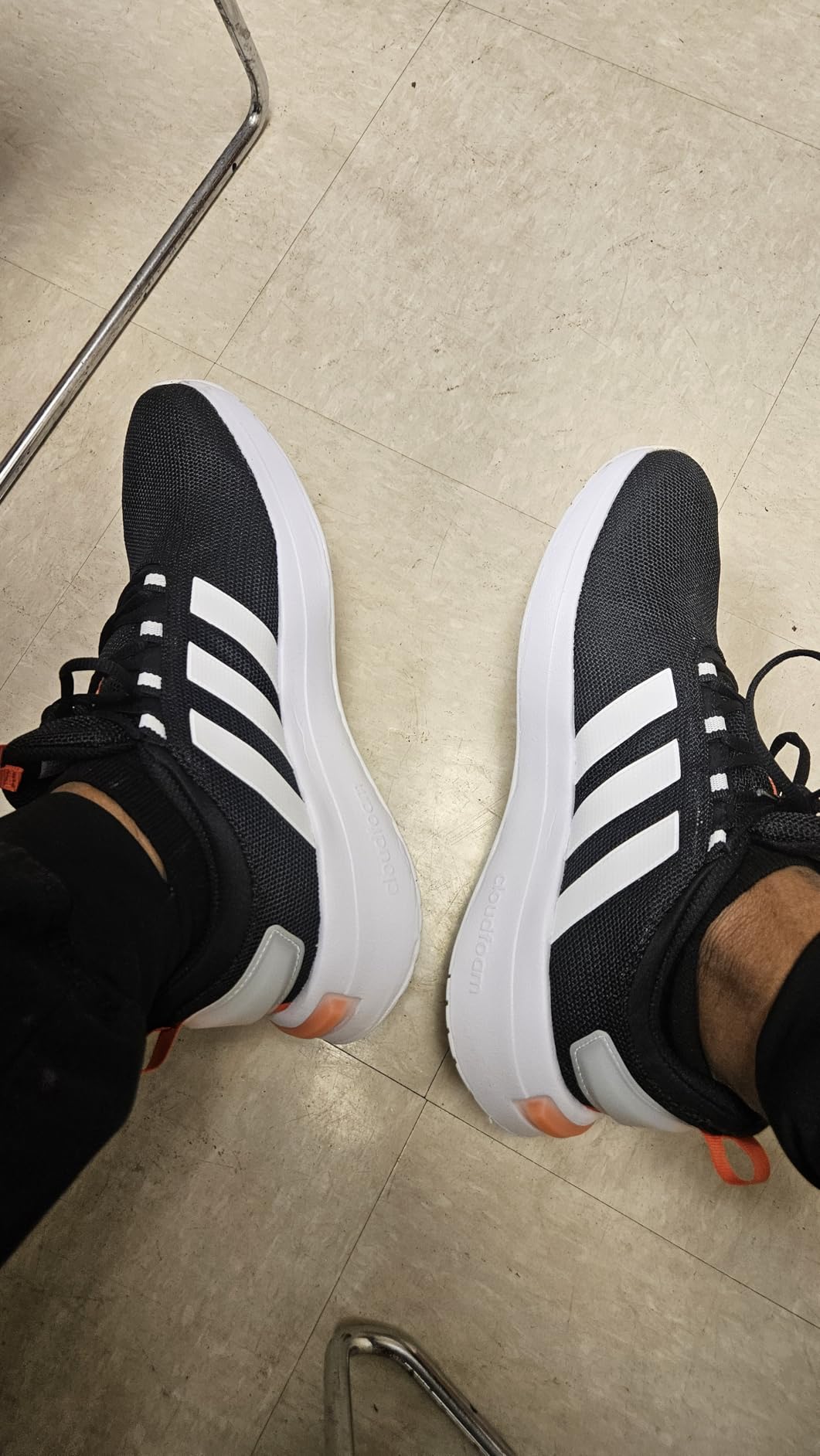 Side profile of Adidas Racer TR23 showing Cloudfoam midsole height and overall shoe silhouette
