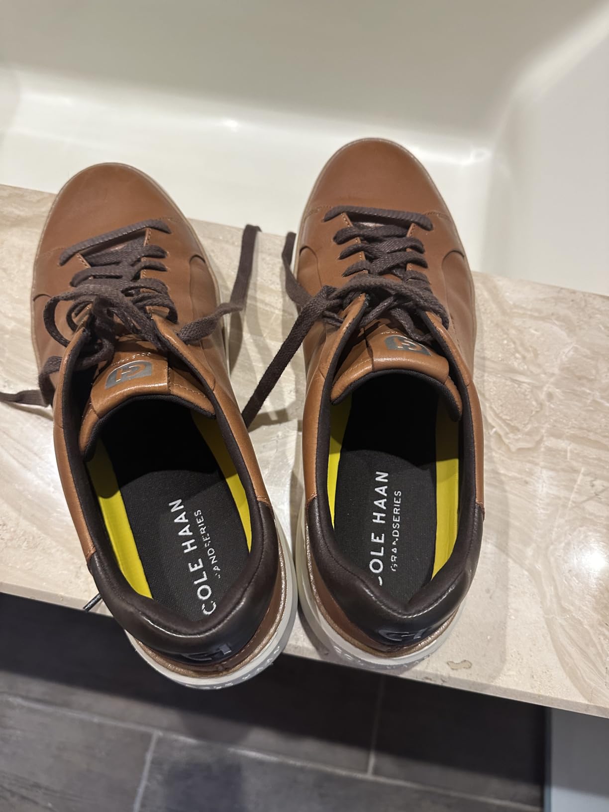 Cole Haan Grandpro Topspin features validation showing waterproof construction and performance details