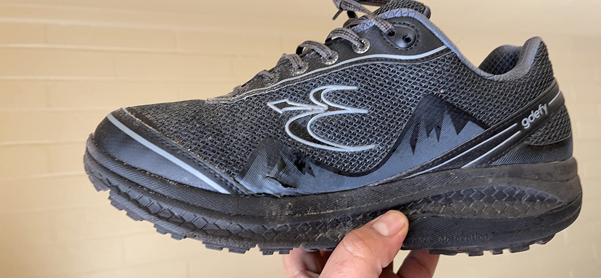 G-DEFY Mighty Walk shoes showing side profile with visible VersoShock heel technology