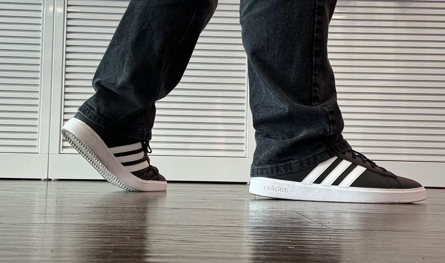 Adidas Grand Court 2.0 detail shot showing synthetic leather quality and construction details up close