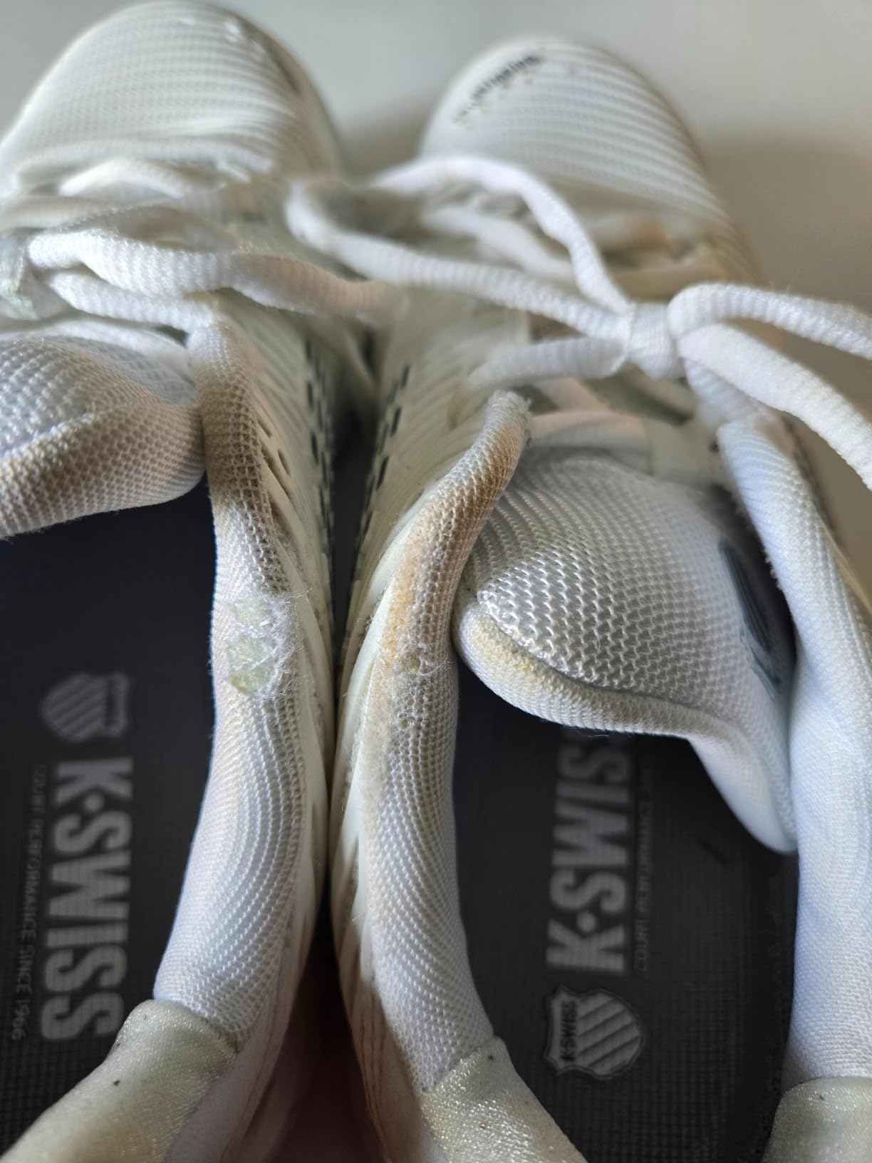 K-Swiss Women's Hypercourt Express 2 showing visible wear and early upper separation after intensive court use period
