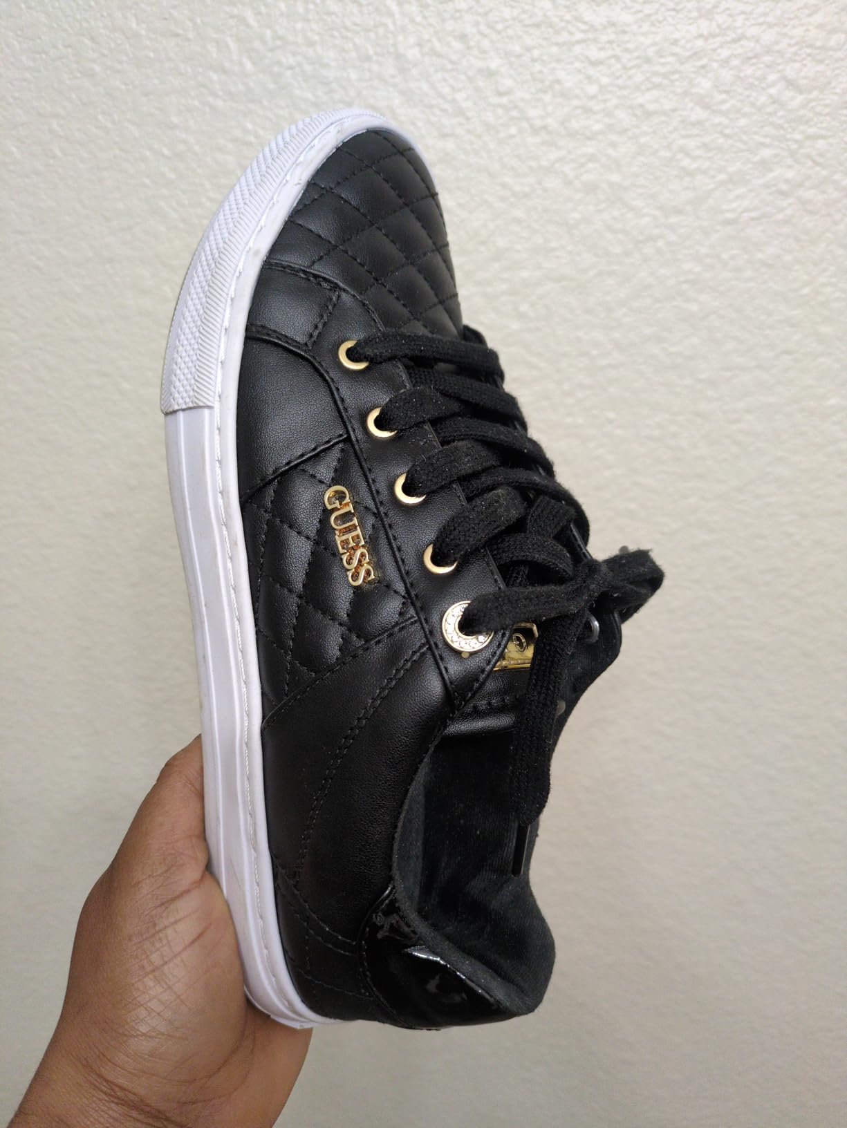 GUESS Women's Loven Sneaker close-up of material quality and construction details at 8 weeks