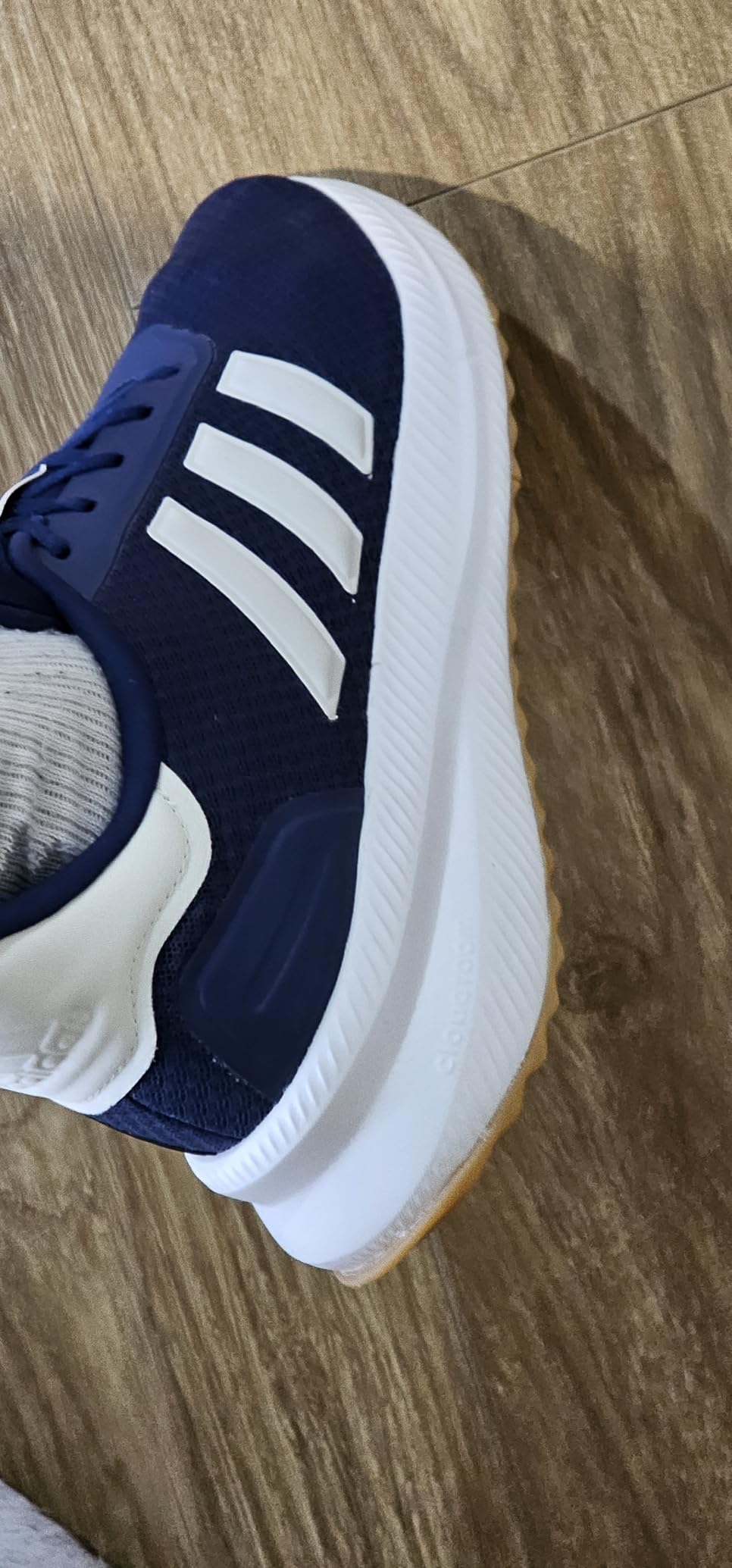 Adidas X_PLR Path being worn during daily urban activities showing real-world use