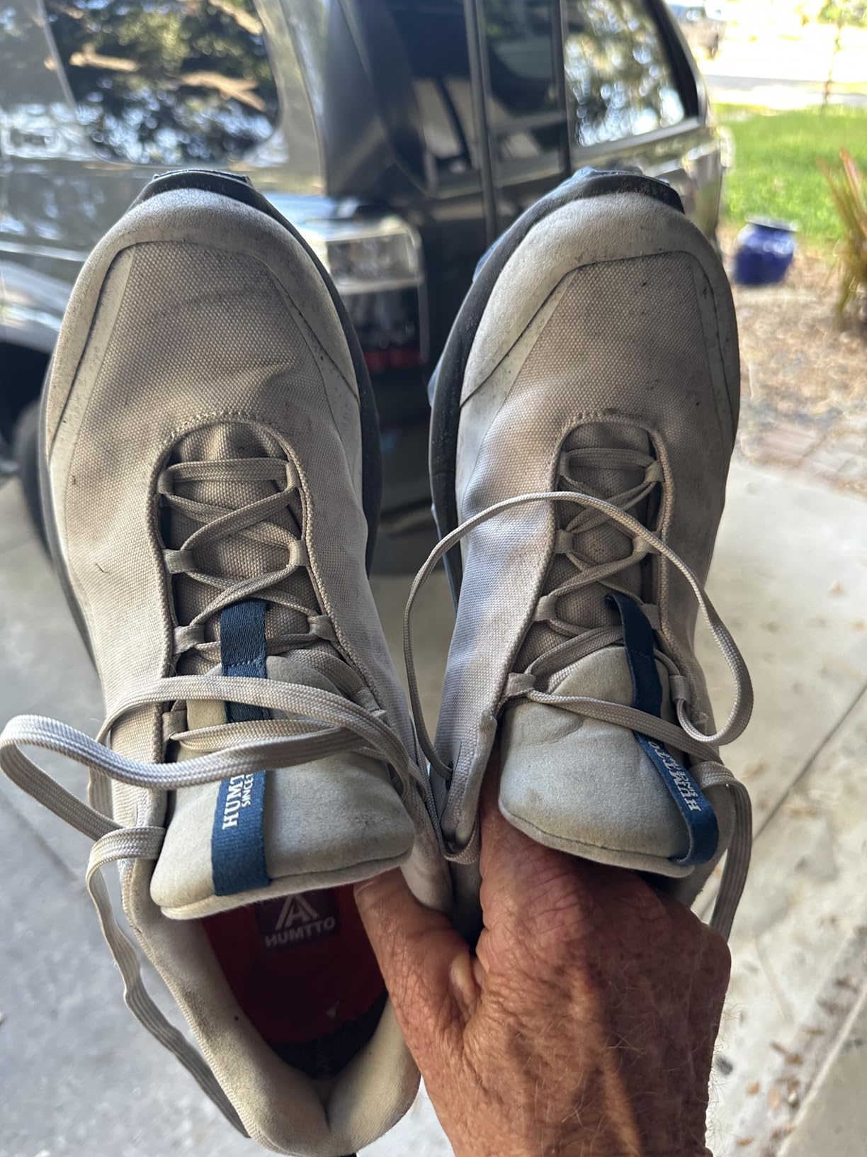 HUMTTO shoes in action on outdoor terrain demonstrating traction performance