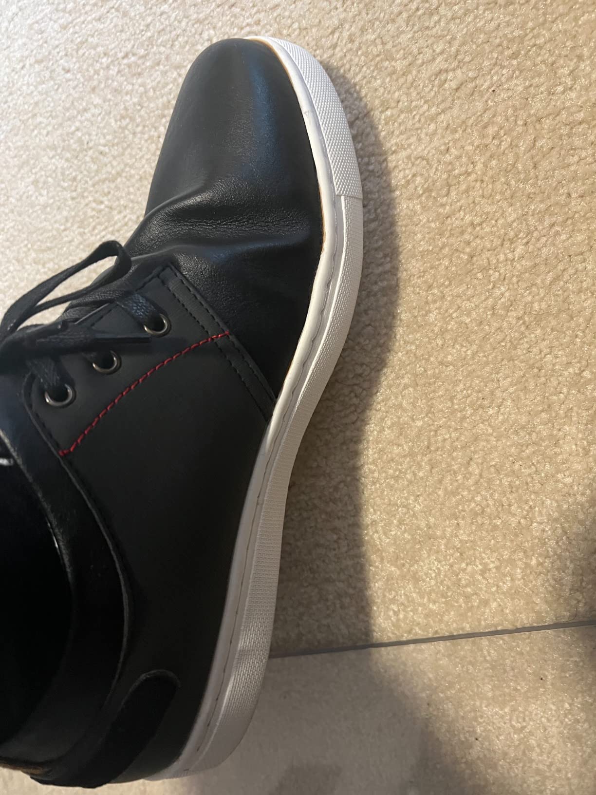 Close-up of Bruno Marc PVC outsole showing minimal tread pattern and sole construction