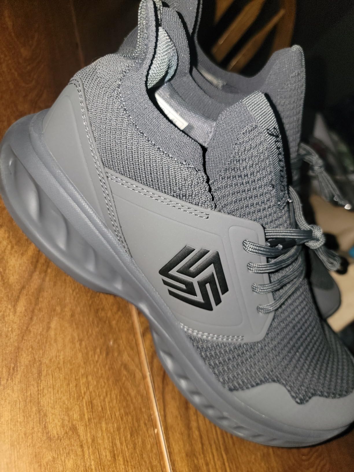 Giniros walking shoes tested across different terrain conditions showing sole grip performance and tread wear comparison