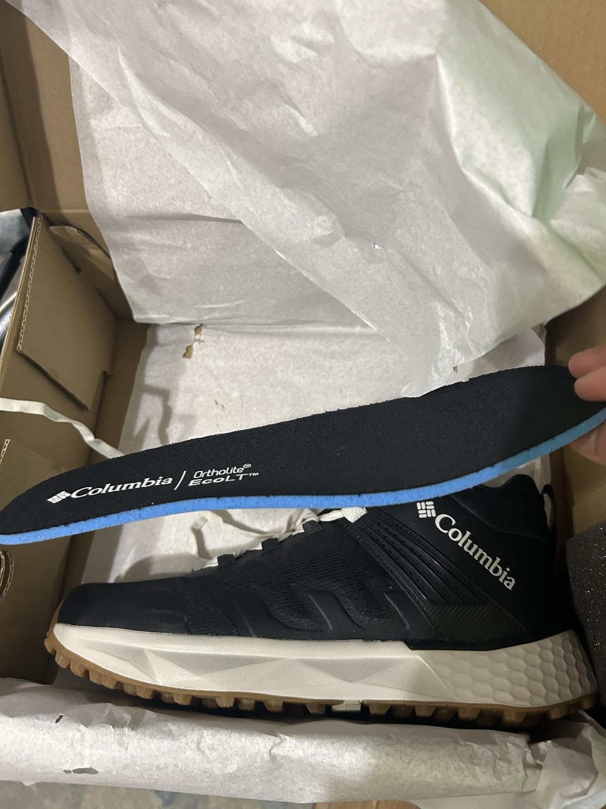 Columbia Facet 75 Mid action shot during hiking showing real-world outdoor performance