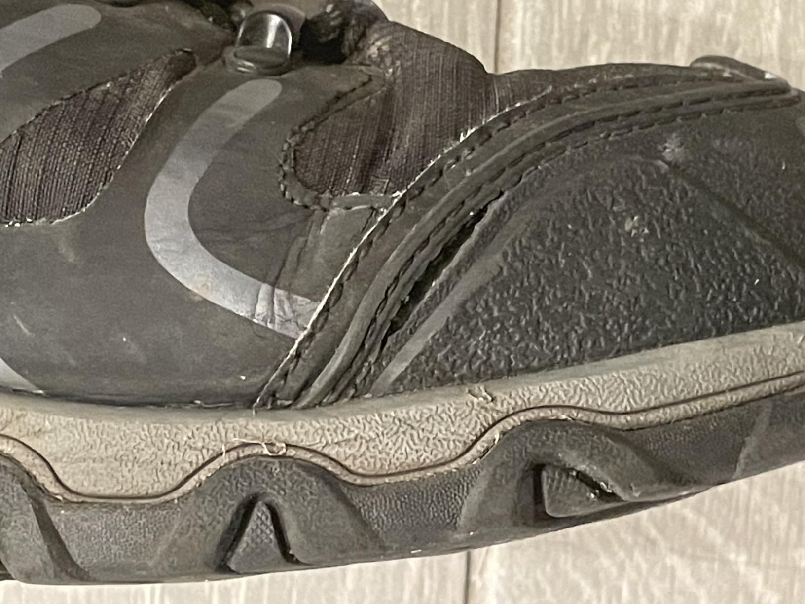 NORTIV 8 hiking shoe side profile showing synthetic leather upper and protective rubber toe cap