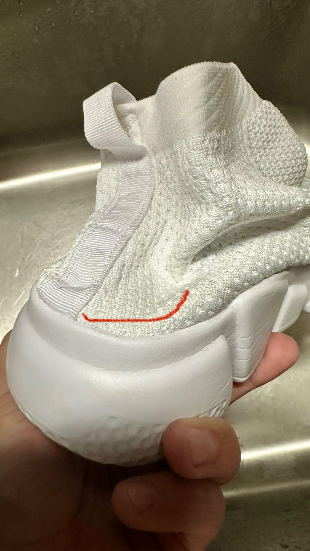 Bottom sole view of Santiro shoes showing MD sole cushioning pattern and tread flexibility