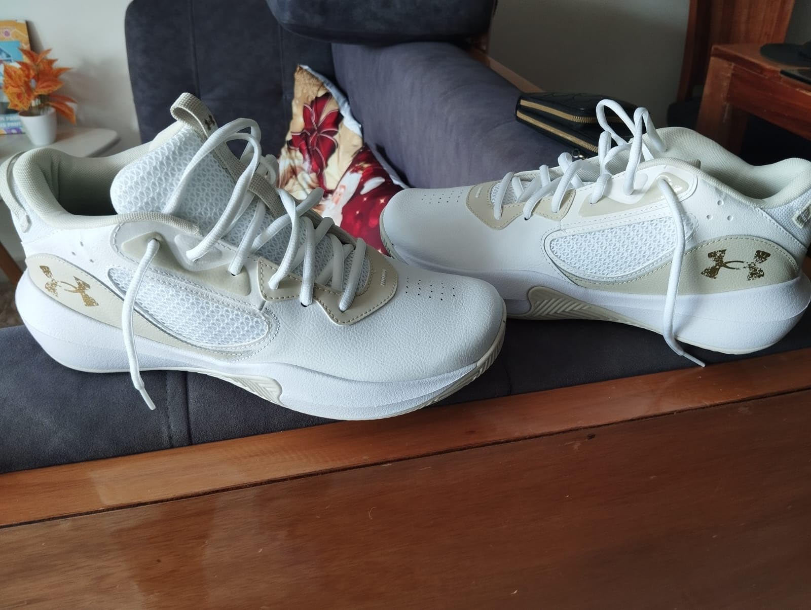 Under Armour Lockdown 6 basketball shoes during court play showing traction on hardwood floor