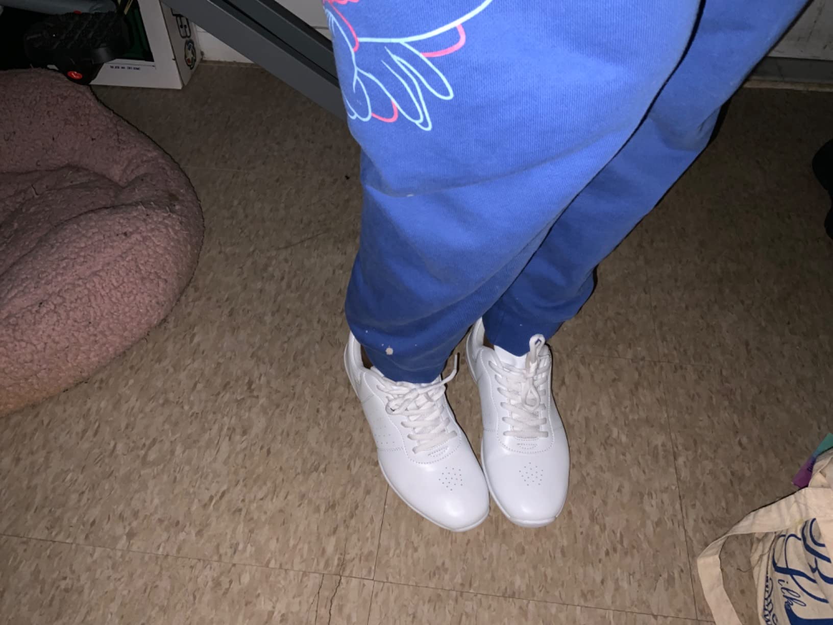 LANDHIKER cheer shoes sizing demonstration showing proper fit with room for cheerleading socks