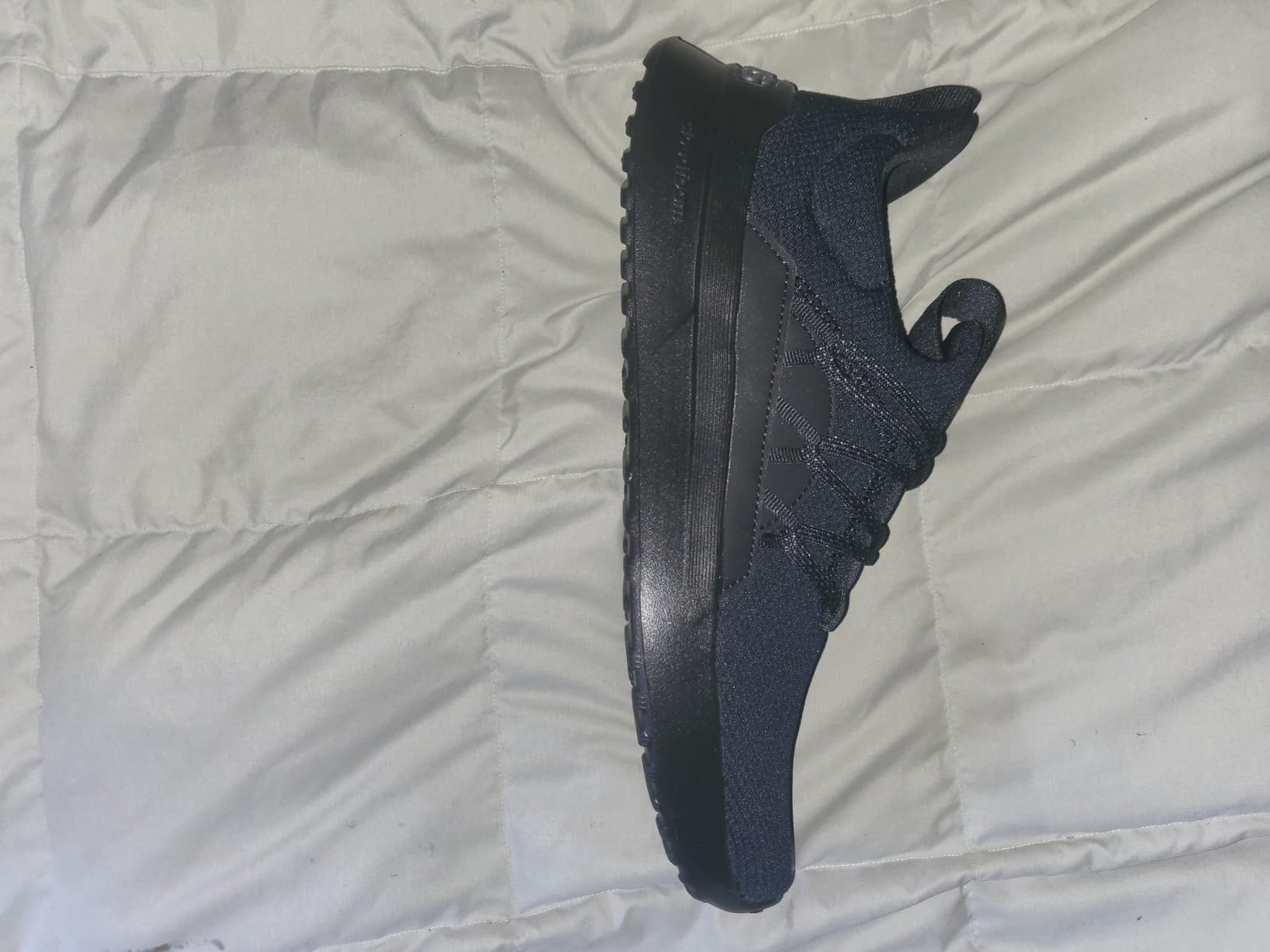 Adidas Men's Lite Racer Adapt 5.0 shown in casual lifestyle setting demonstrating everyday versatility