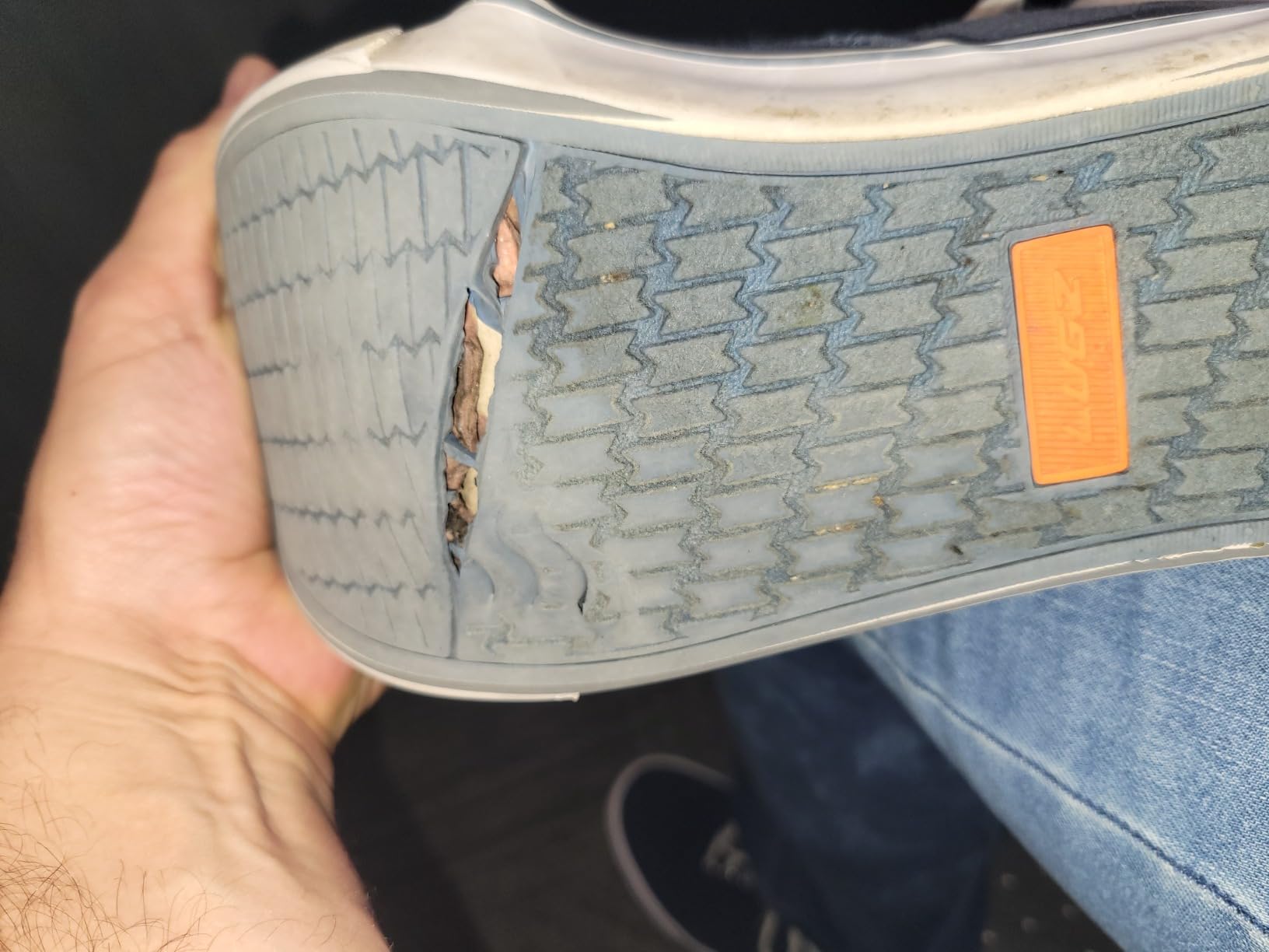 Close-up of Lugz Lear sole separation showing adhesive bond failure at canvas to rubber junction