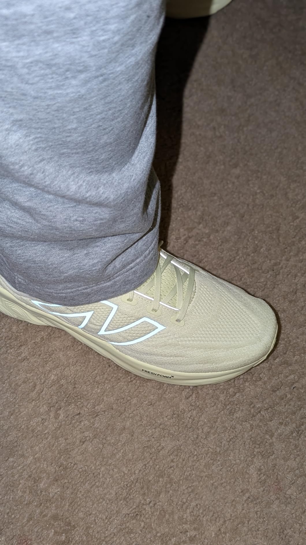 New Balance 1080 V13 upper construction detail showing engineered mesh and lacing system