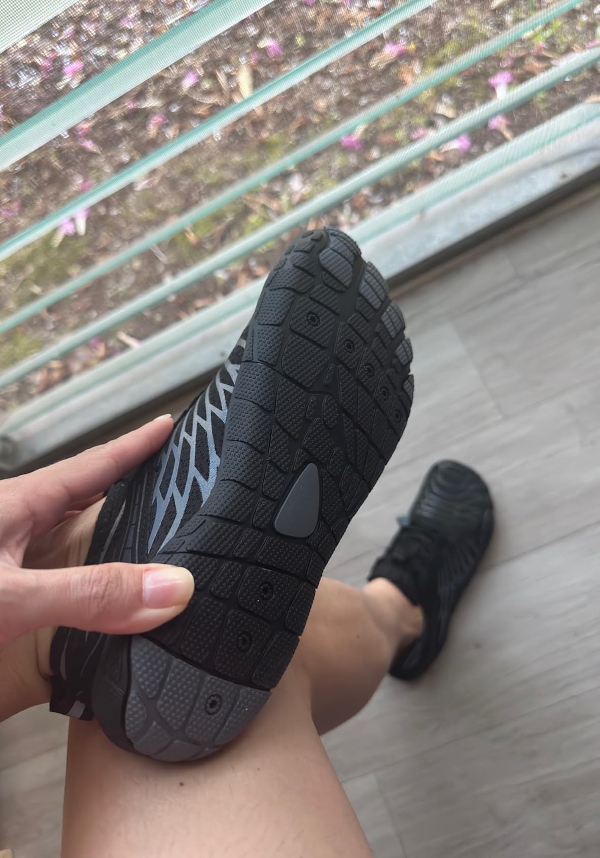 JMZB hiking shoes on rocky terrain testing in natural environment