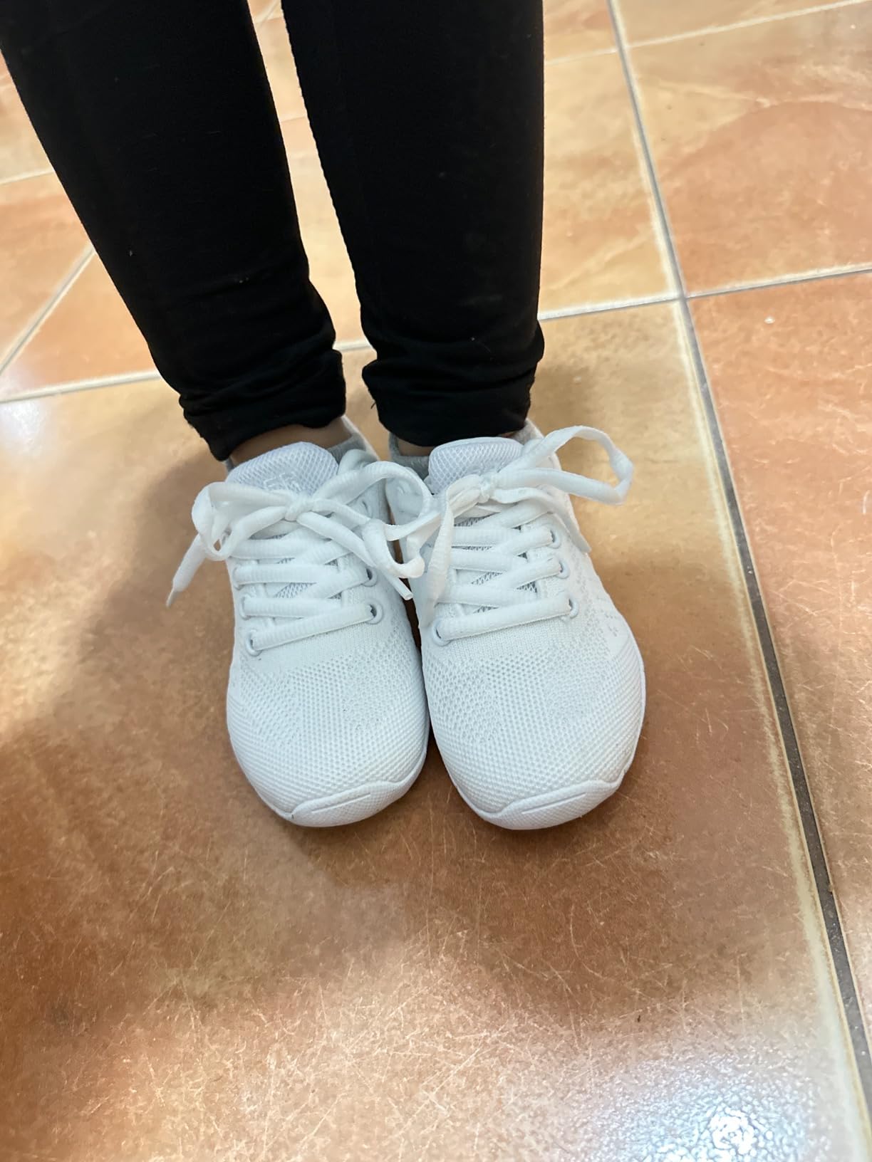 BAXINIER cheerleading shoes sole pattern showing wave grip design for traction during stunts