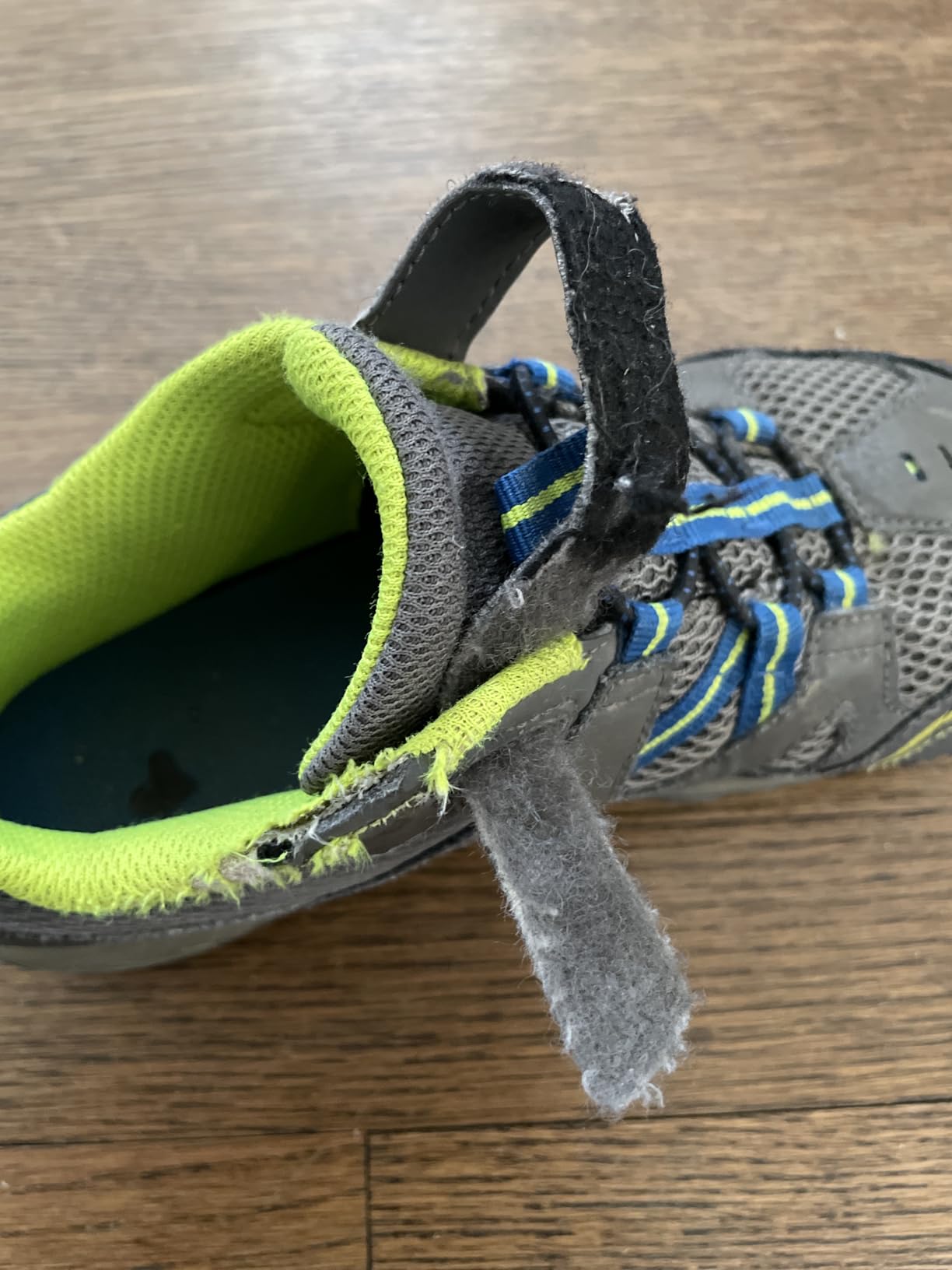 Sole separation visible on Merrell Trail Chaser 2 Jr after two months of wear showing adhesive failure at heel