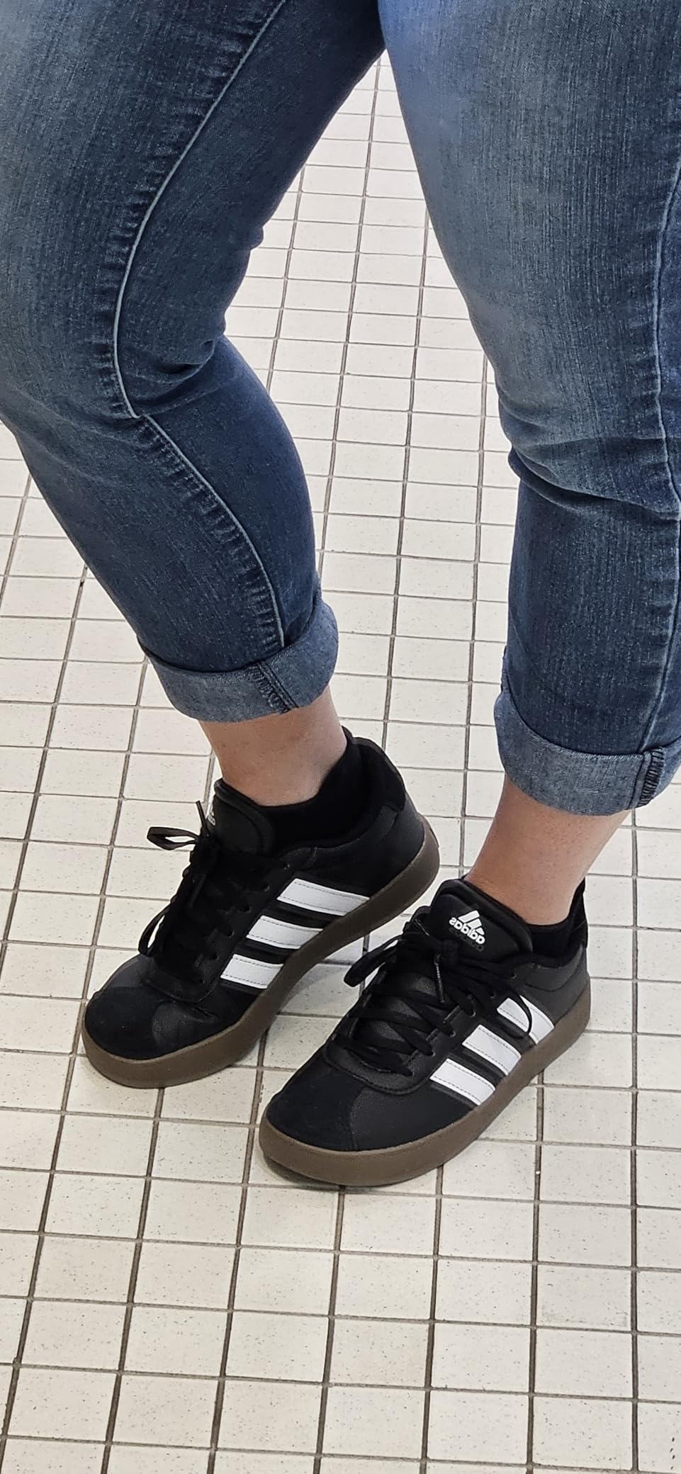 Kids wearing Adidas VL Court 3.0 during active play showing real-world durability and performance in playground scenarios