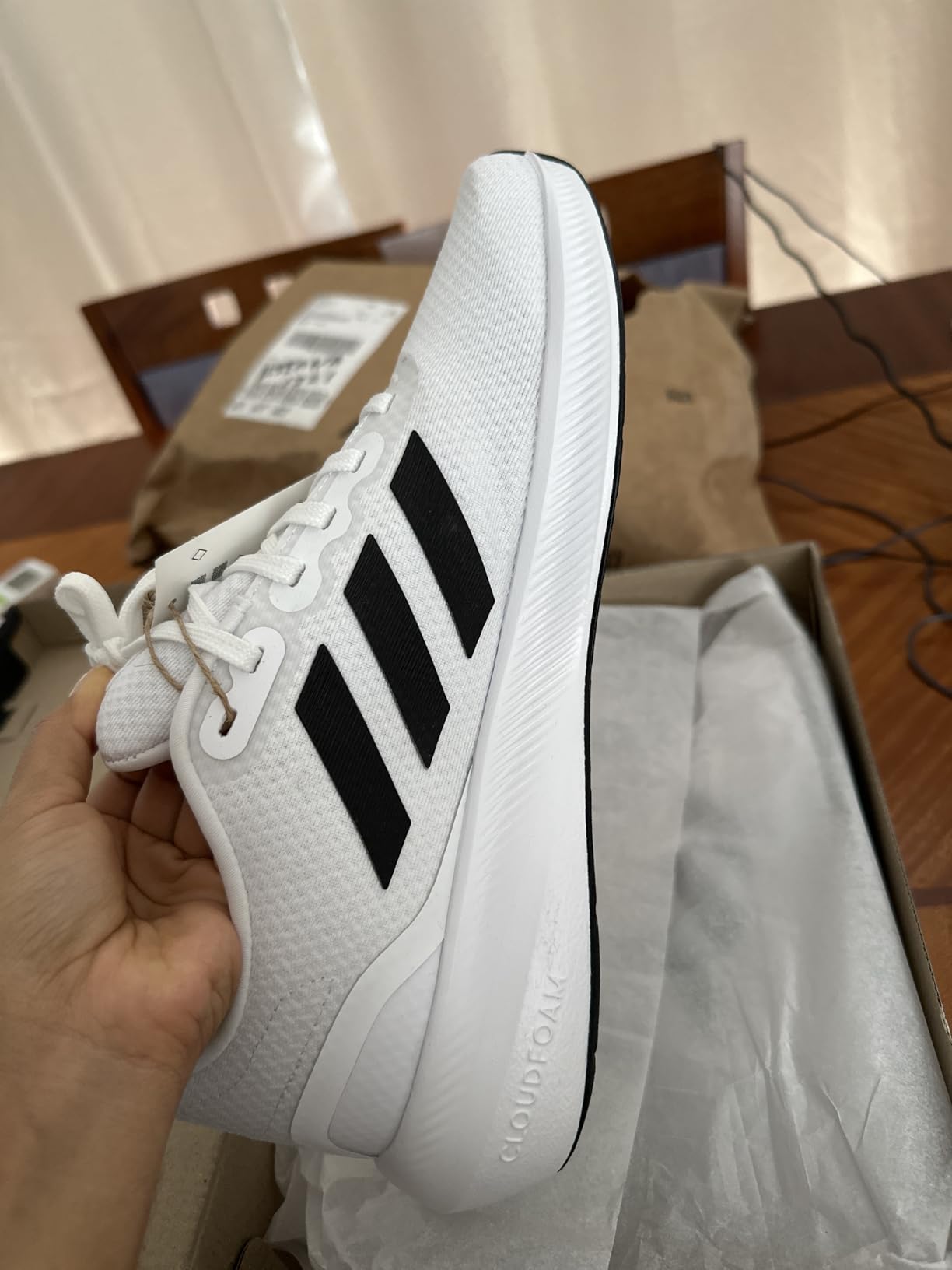 Bottom view of Adidas Run Falcon 3.0 showing detailed rubber outsole tread pattern designed for traction