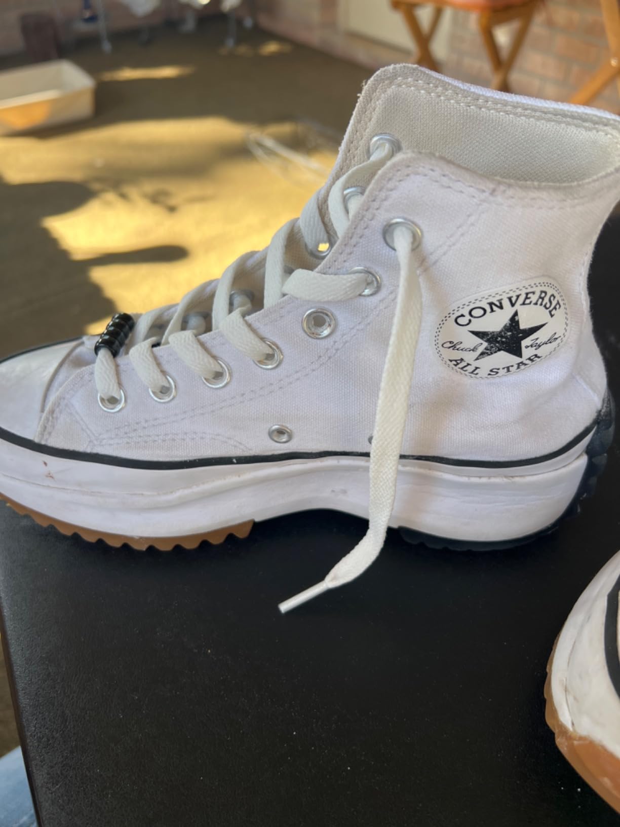 ZHENTOR laces properly installed on white sneakers showing flat profile and tension