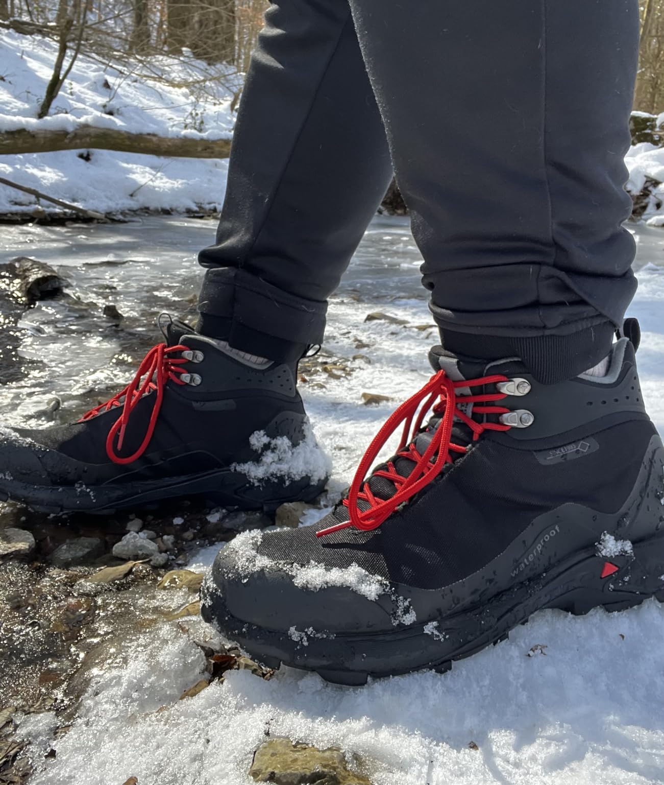 HUMTTO boots outsole detail showing aggressive multi-directional lug pattern and rubber compound