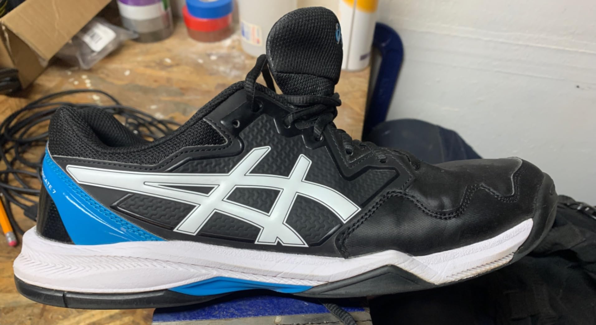 Severe sole wear showing holes through to midsole after 2 months of regular pickleball and tennis use