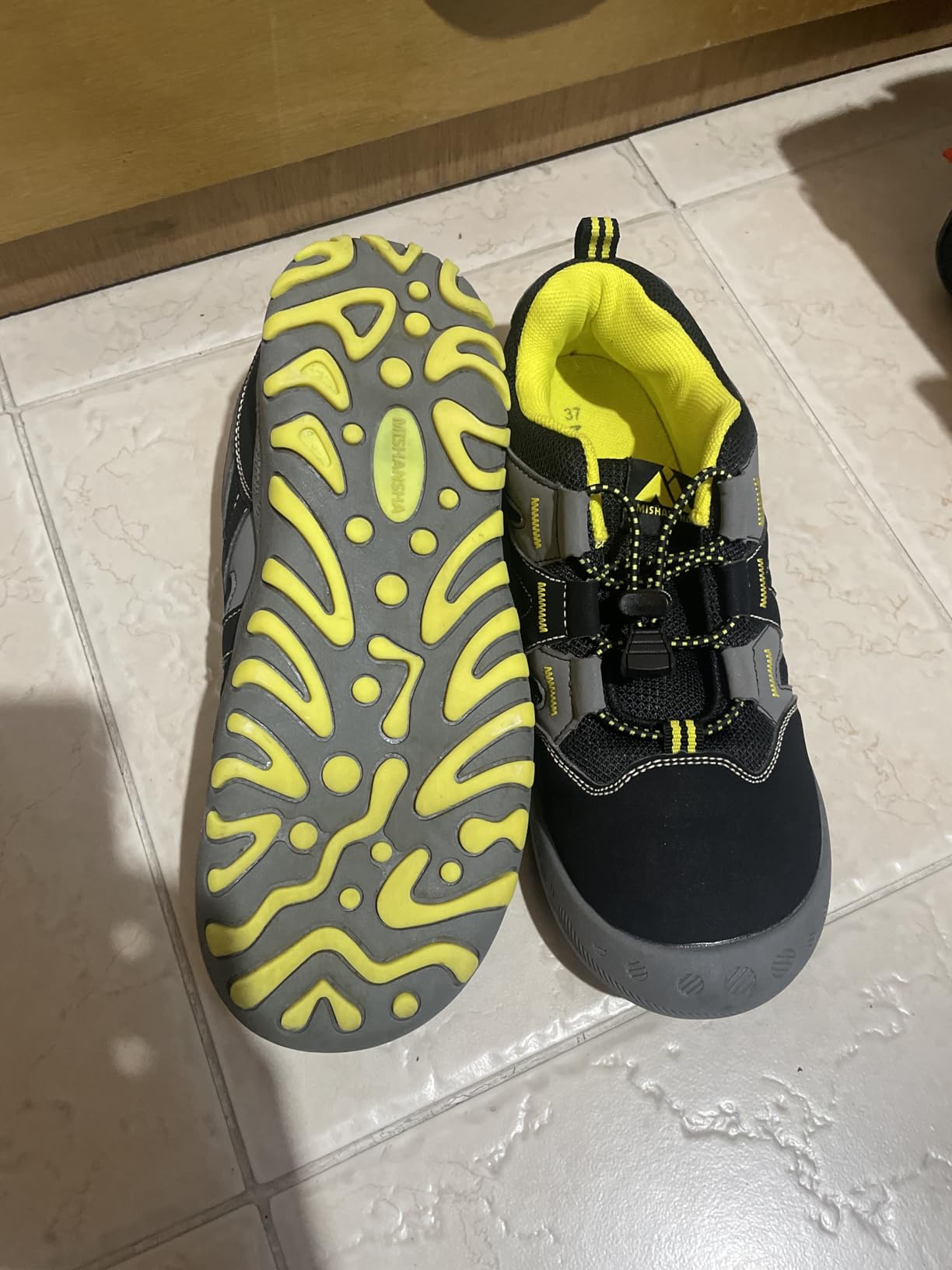Side profile view of Mishansha Kids Hiking Boots showing wide toe box design and ankle support structure