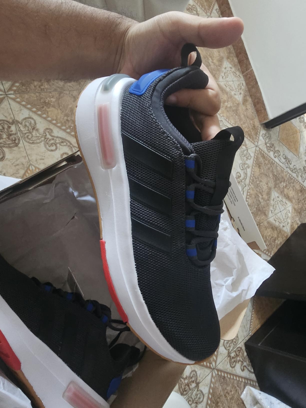Adidas Racer TR23 construction detail showing stitching quality and no-sew overlay construction