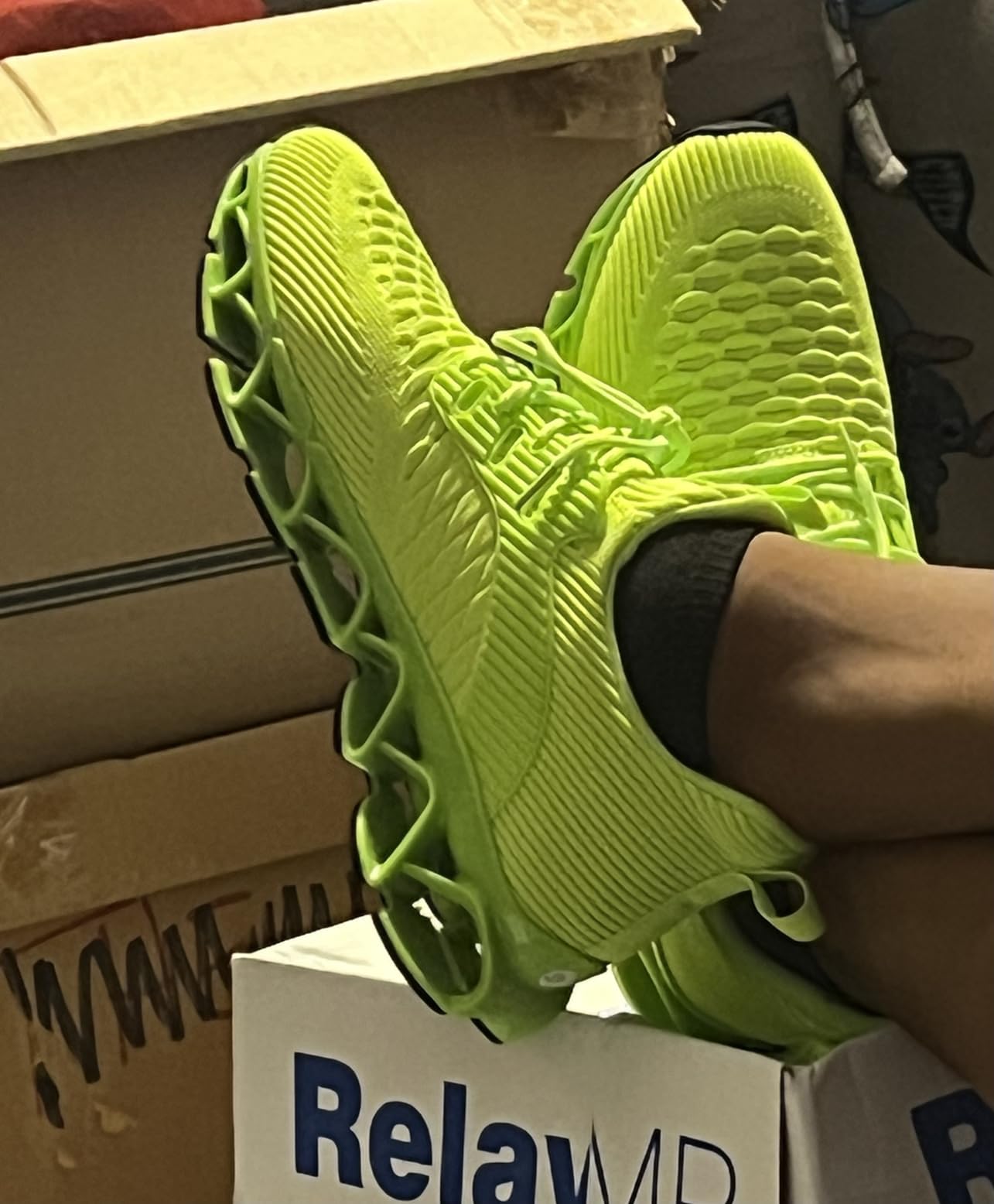 Side view of Srenket blade sneakers highlighting the bright yellow colorway and eye-catching lattice sole design