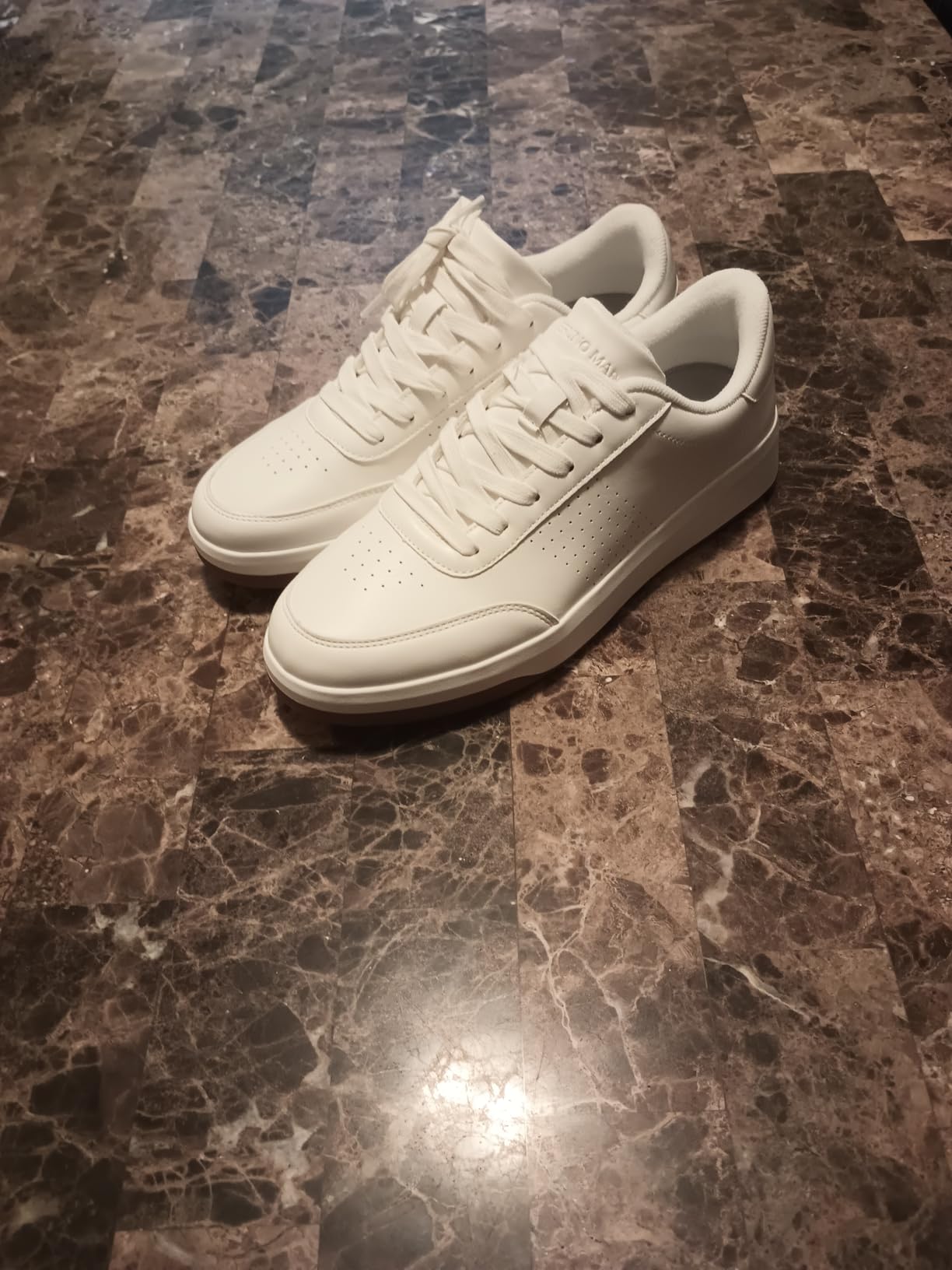 Bruno Marc sneakers worn on feet showing outsole profile and how they look with casual jeans in real-world use