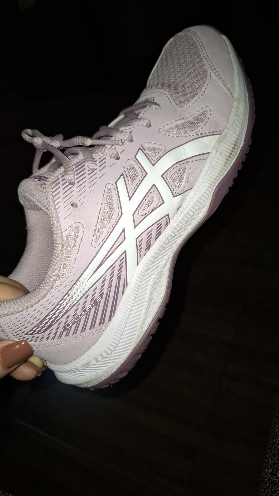 ASICS Upcourt 6 being worn during active volleyball play