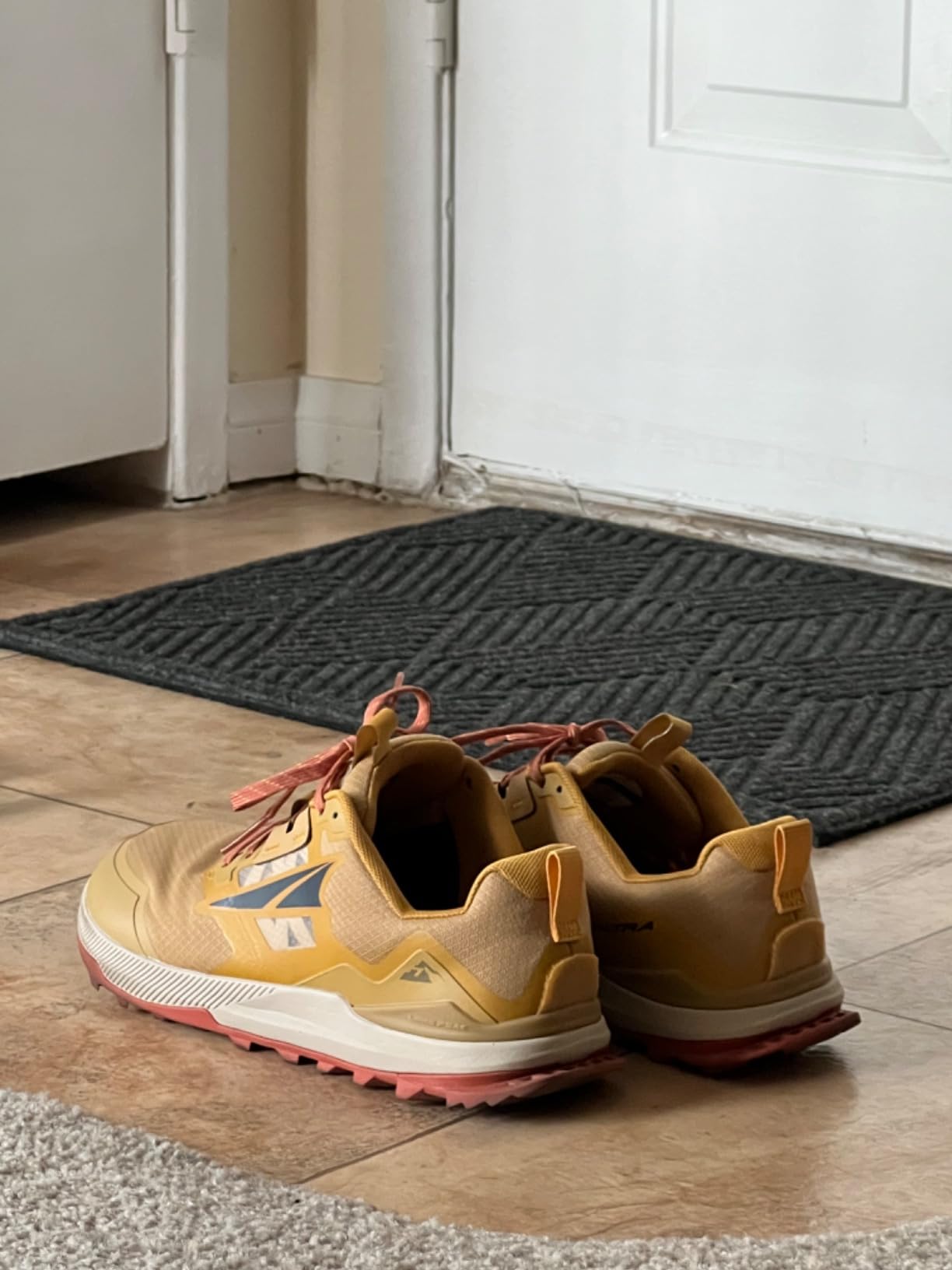 Side profile of Altra Lone Peak 7 showing zero drop platform and EGO foam midsole construction