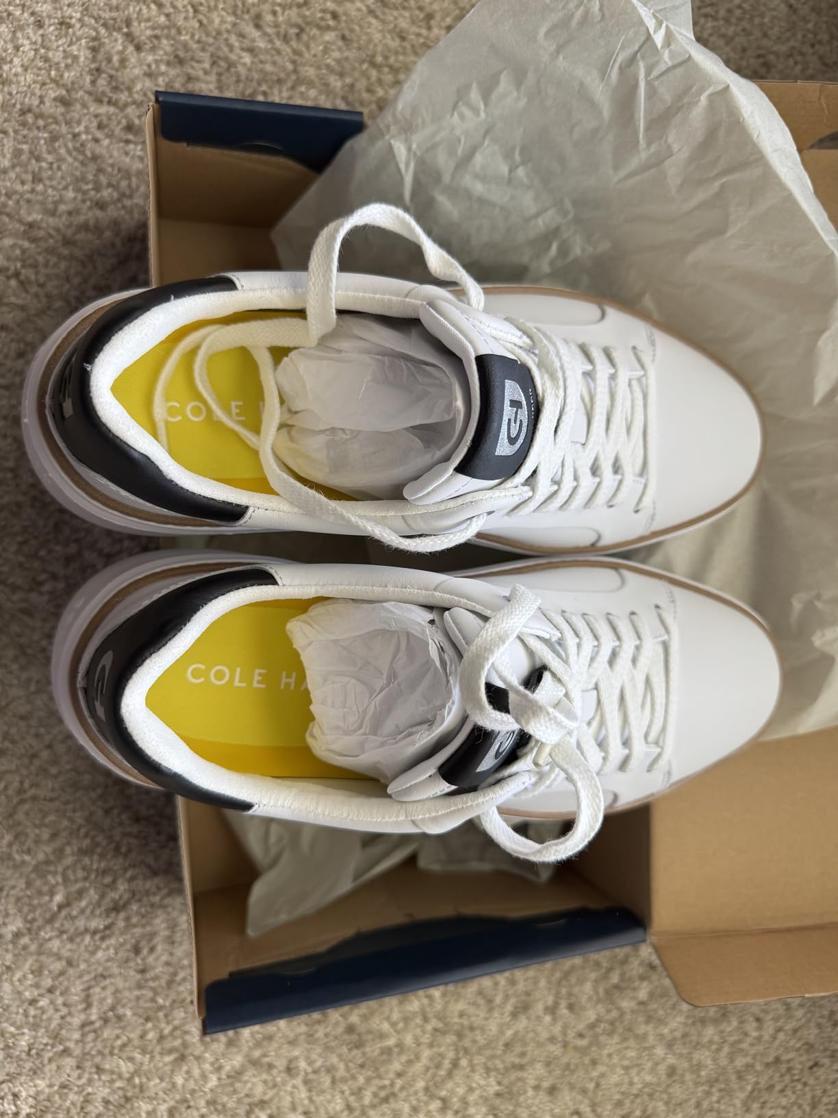 Bottom view of Cole Haan Grandpro Topspin showcasing spikeless rubber traction pattern designed for golf and versatile surfaces