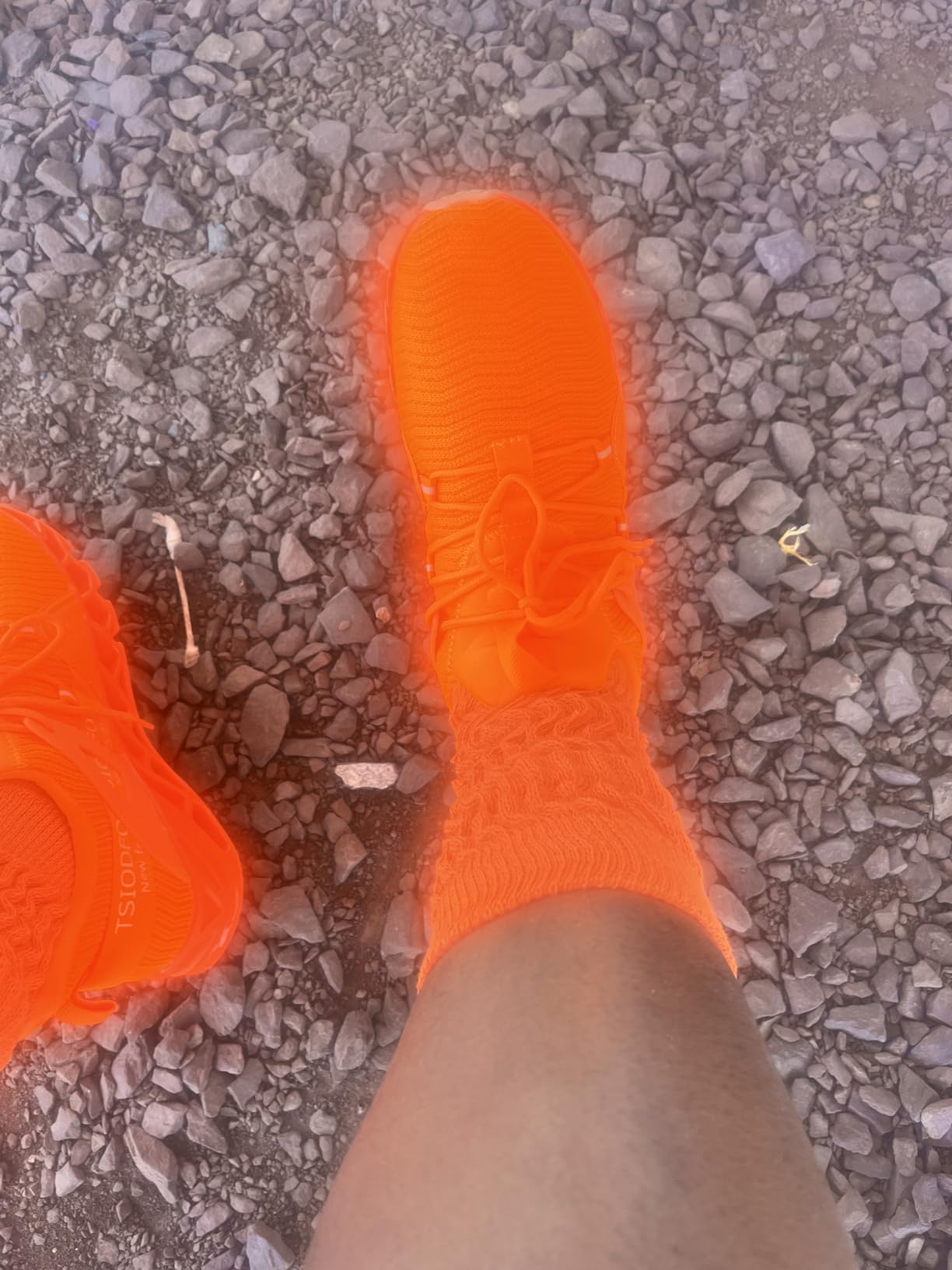 Close-up detail of Ezkrwxn sneakers showing construction quality and material finish