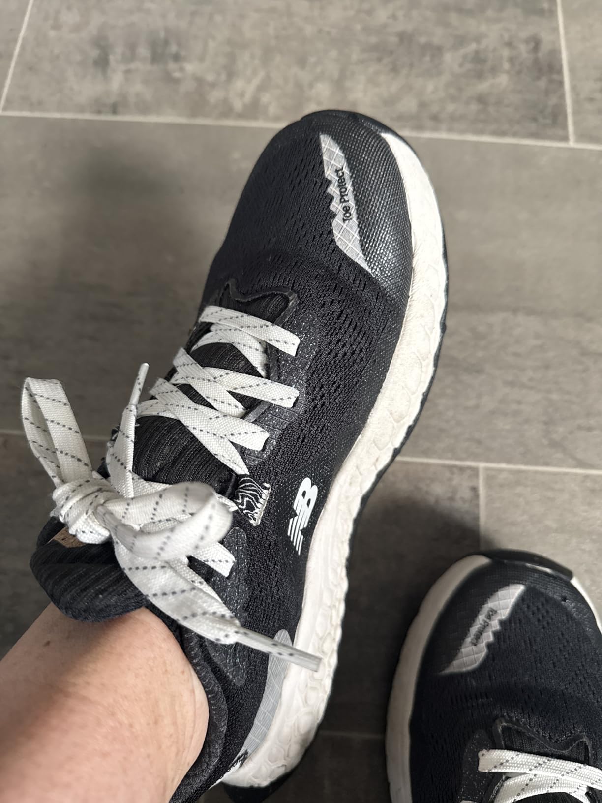 New Balance Hierro V7 bottom view showing Vibram Megagrip outsole and lug pattern