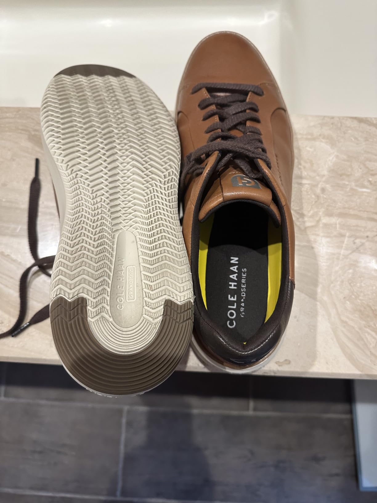 Cole Haan Grandpro Topspin lifestyle shot demonstrating versatile wear from golf to casual business settings