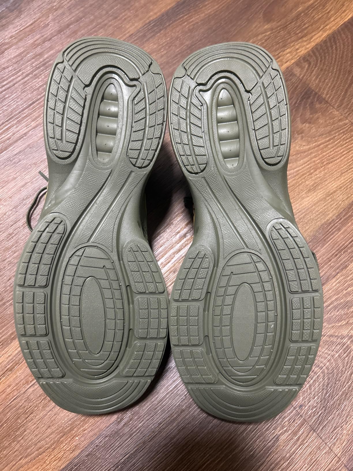 Giniros slip on walking shoes showing knitted mesh upper construction and EVA outsole design from side angle