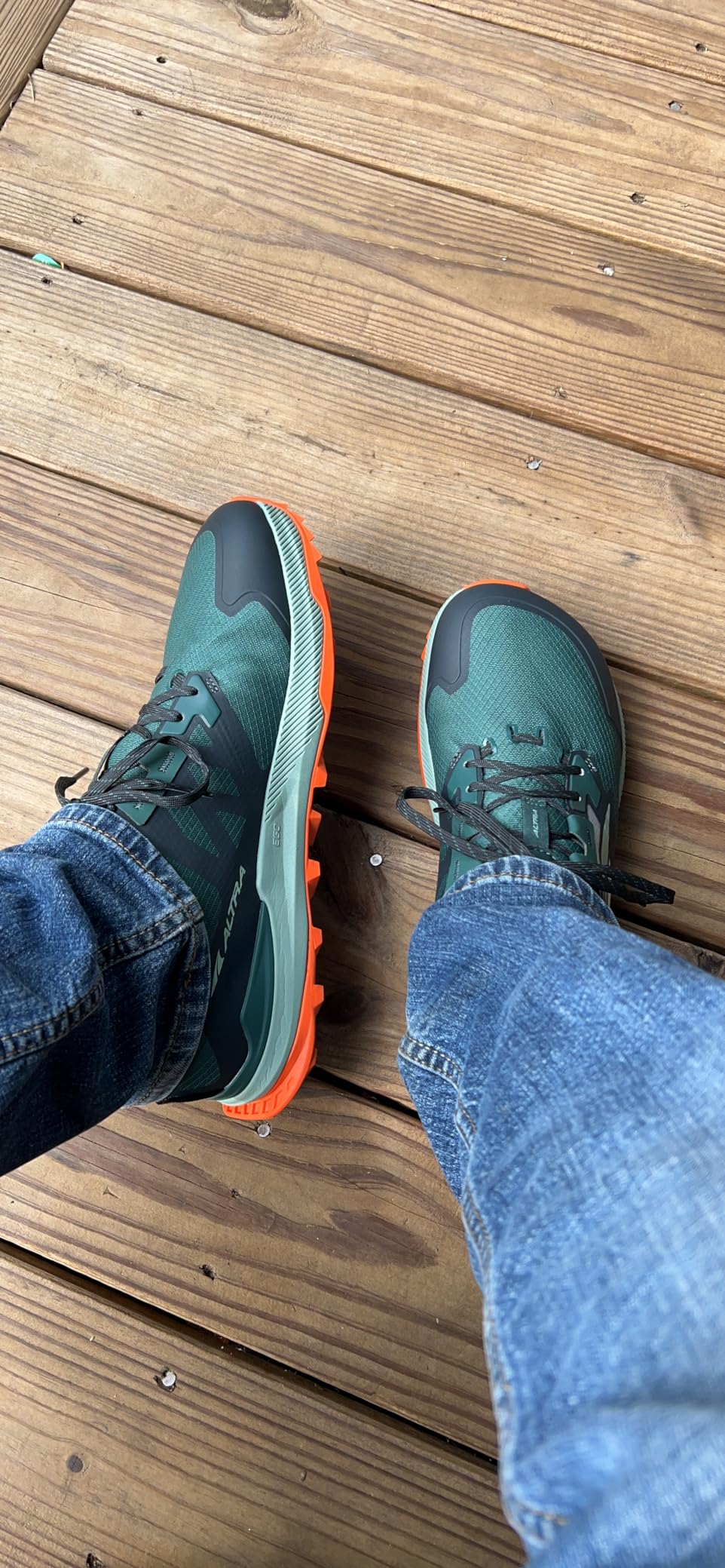 Altra Lone Peak 7 on technical trail terrain demonstrating grip and stability on roots and rocks