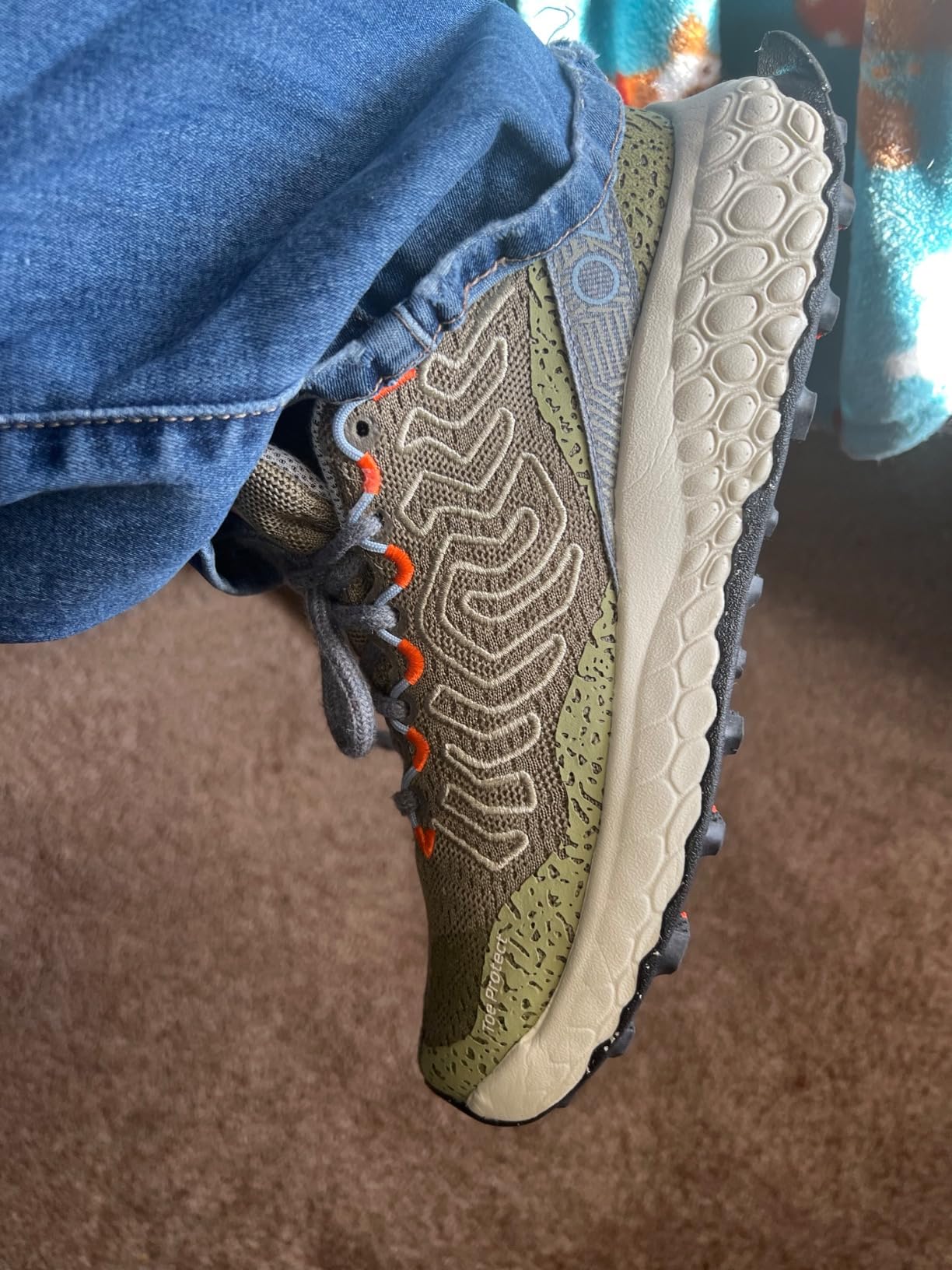 New Balance Hierro V7 trail shot showing shoe flex and outsole engagement on rocky terrain