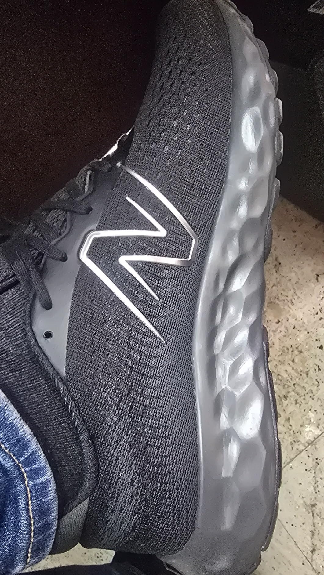 New Balance 520 V8 shown after outdoor running with visible wear patterns on outsole after 100+ miles of testing