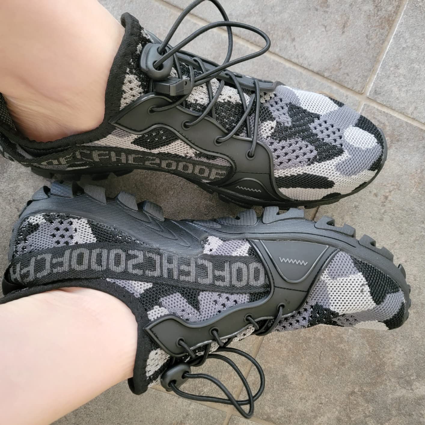Close-up of TANGYUGEN water shoes knit mesh upper texture and elastic lacing system detail