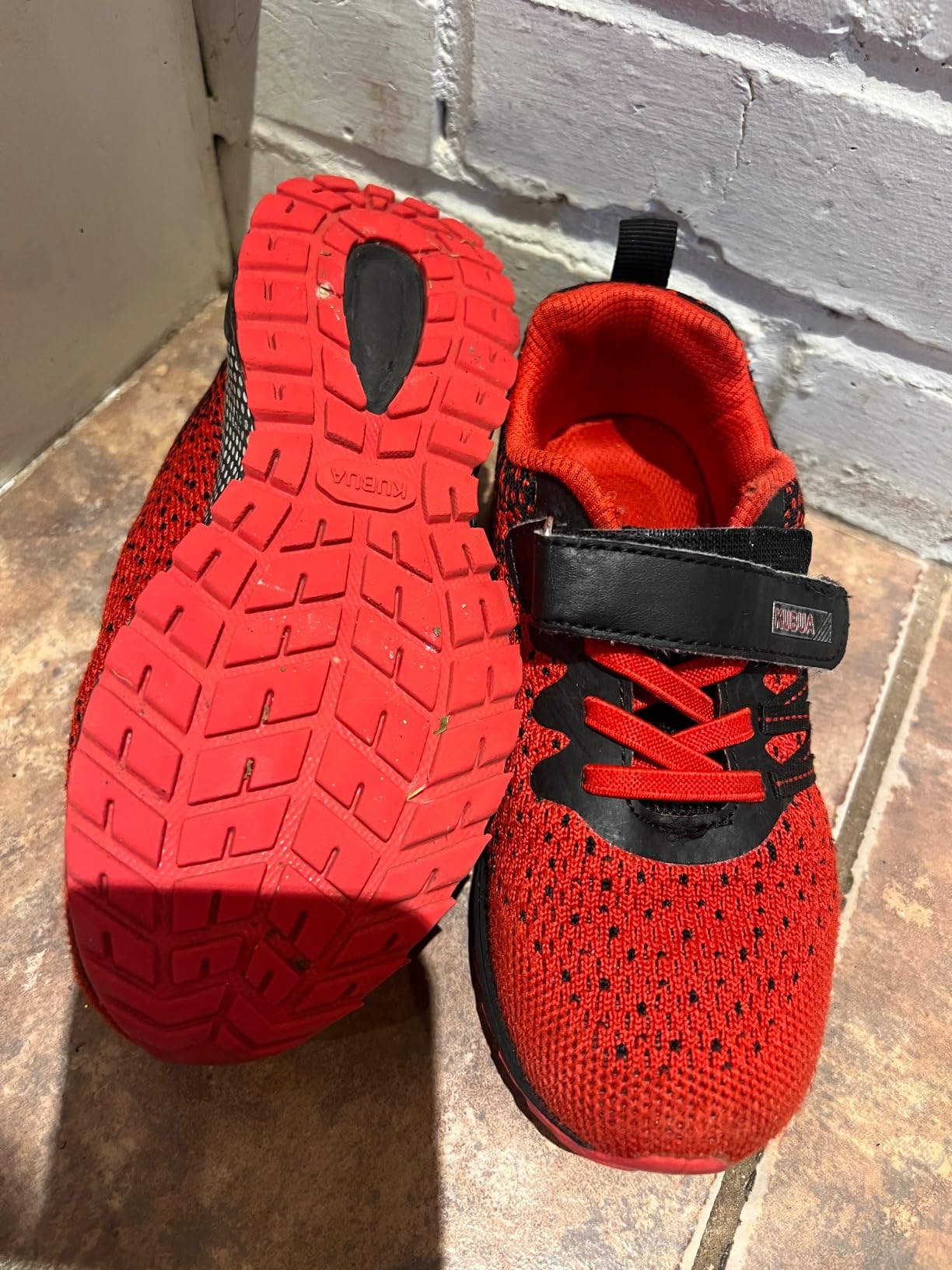 KUBUA Kids Sneakers side view showing breathable mesh upper and EVA rubber outsole construction