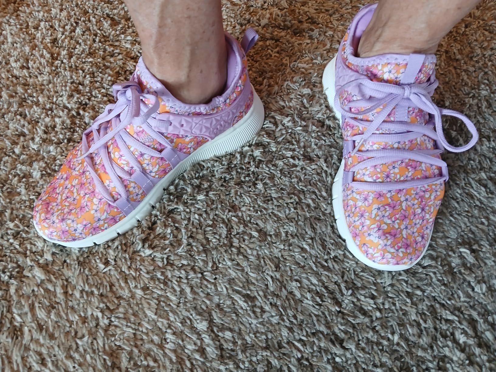 INZCOU running shoes lifestyle shot showing the colorful slip-on design in use during daily activities