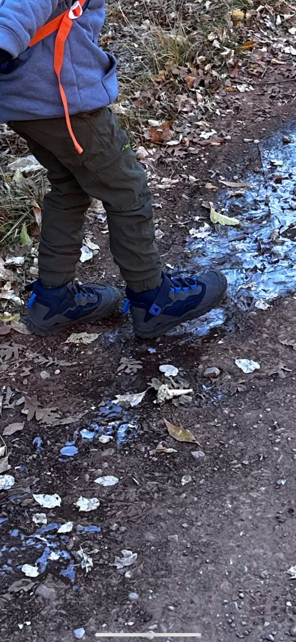 Mishansha kids hiking boots on outdoor terrain showing grip and water resistant performance in real conditions