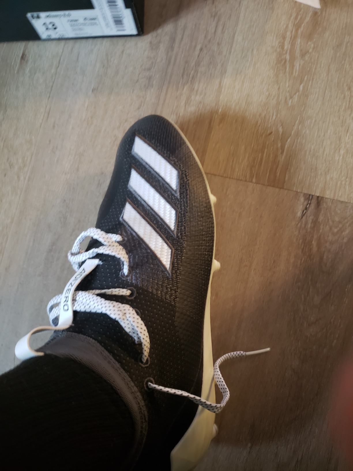 Multiple Adidas Adizero Scorch colorway options showing white black and colored variants