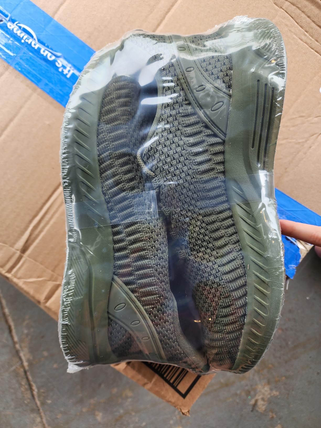 Feethit women's sneakers in olive green showing breathable mesh upper and slip-on silhouette