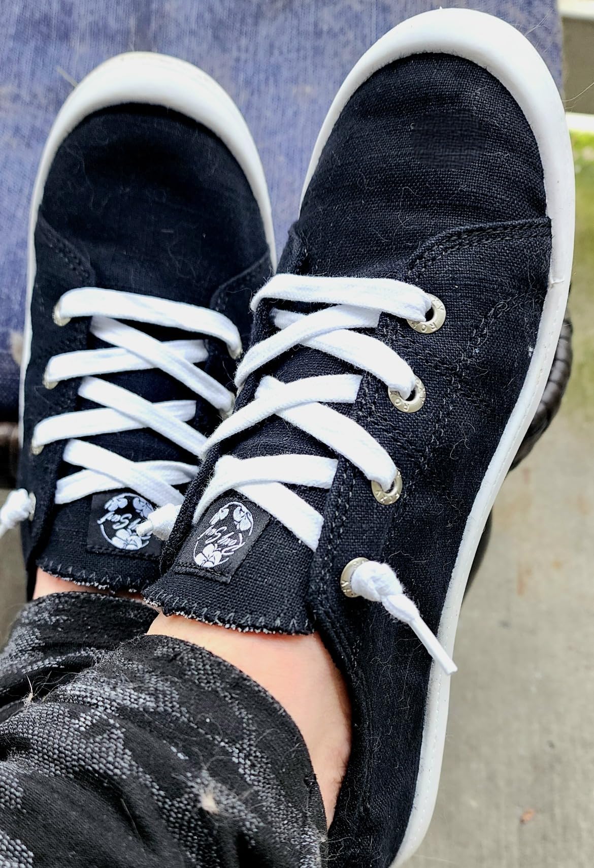 Close-up view of Roxy Rory textile upper showing stretch panels and slip-on collar construction