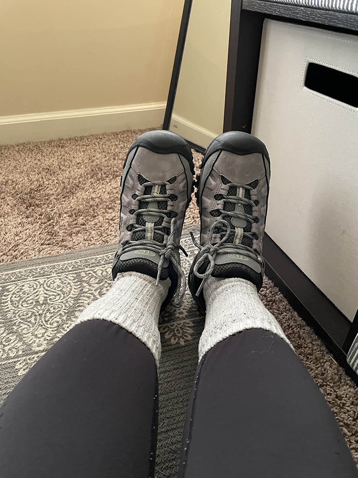 KEEN Women's Targhee III on muddy trail demonstrating KEEN.DRY waterproof membrane performance in wet Pacific Northwest conditions