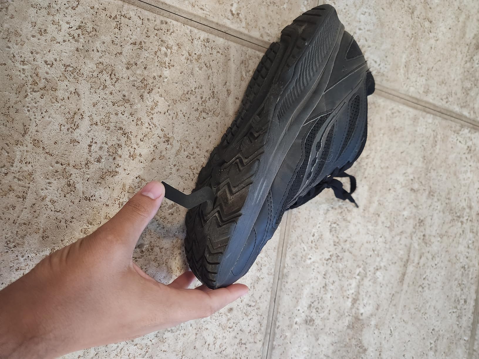 Saucony Cohesion 14 TR detailed side view showing leather upper construction and VERSARUN midsole technology