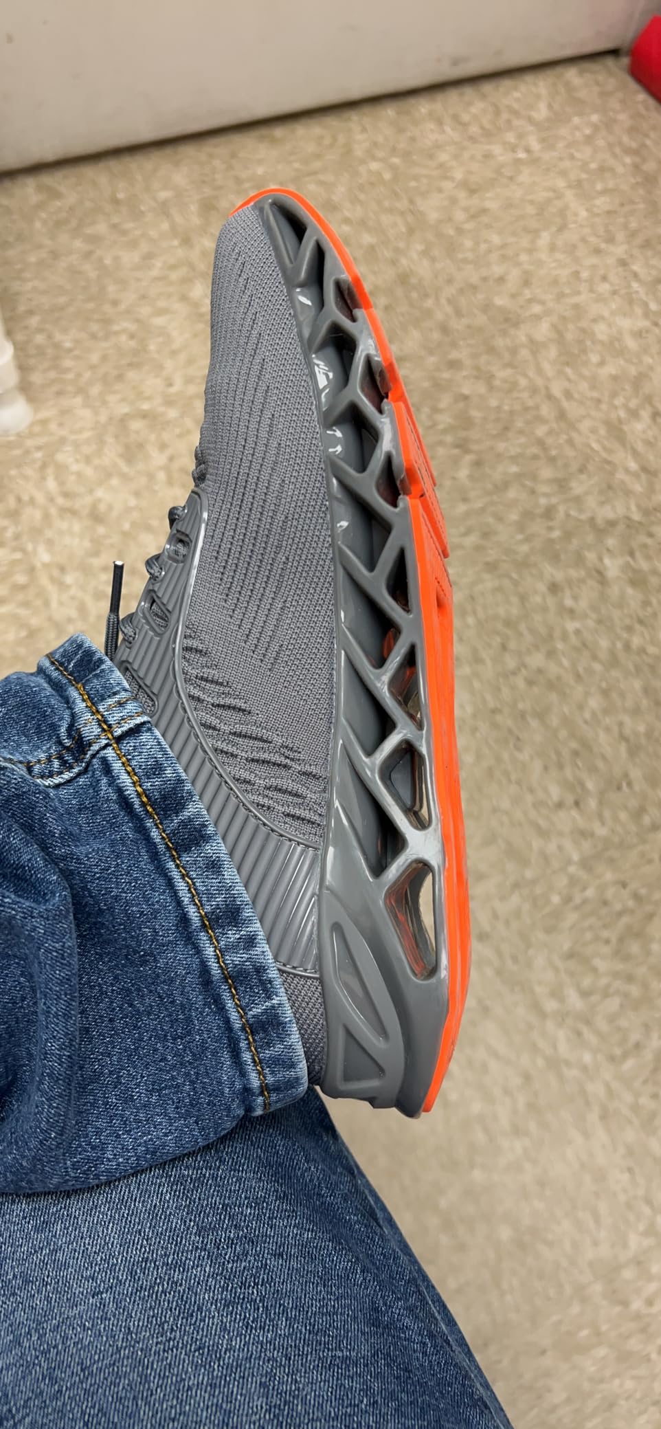 Close-up of SKDOIUL mesh upper construction showing breathable fabric and lacing system